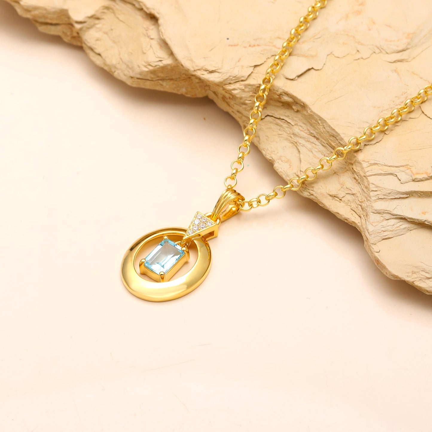 Hollow Blue Topaz Pendant